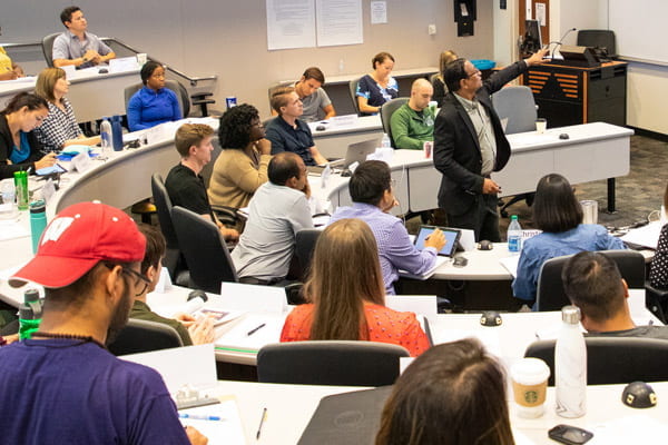 Professor Abhijit Biswas leading a class of UT Dallas MBA students