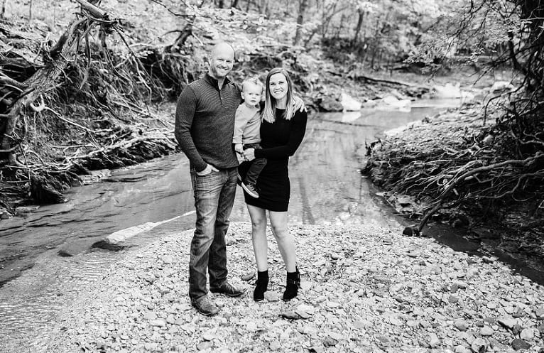 MBA Alumnus Ellison Jason Lindsey wife and child in front of a river 2018